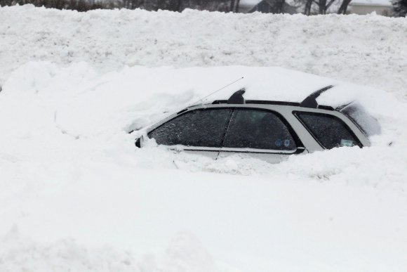 „Reuters“/„Scanpix“ nuotr./Automobilis sniege
